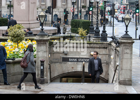 Commuter exiting Bank Underground Station in the City of London, United Kingdom. Morning rush hour scene in the capital’s financial district. Stock Photo