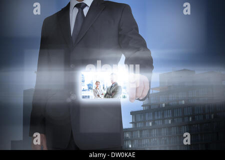 Stylish businessman using digital interface Stock Photo