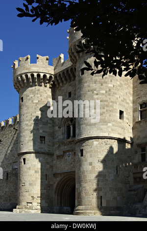 Medieval castle entrance with two towers in front at summer sunny day against clear blue sky. Stock Photo