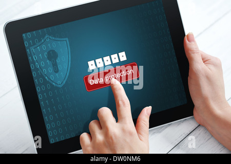 Female hands using tablet pc protected with password Stock Photo
