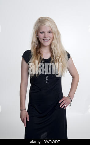 young woman in black dress Stock Photo