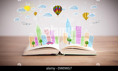 cityscape drawing on open book Stock Photo
