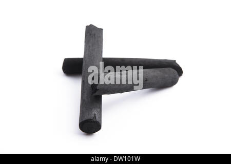 Artist's black charcoal isolated on white Stock Photo