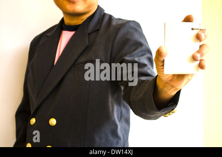 businessman making notes on the paper, white background Stock Photo
