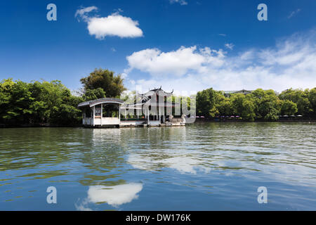 stone boat in lake Stock Photo