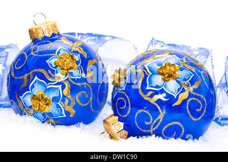 blue Christmas balls on snow background Stock Photo