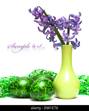 Easter eggs with spring flowers Stock Photo