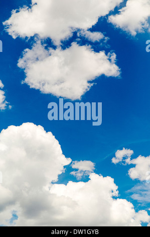 Wispy white clouds float in an azure blue Colorado sky Stock Photo