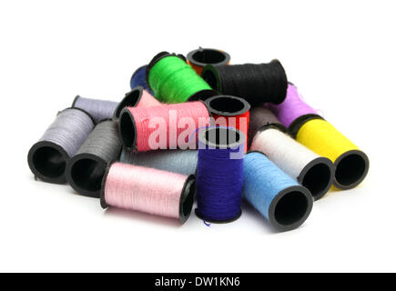 lot of colored thread spools Stock Photo