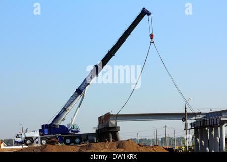 crane on the construction of overpass Stock Photo