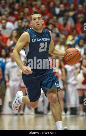 Albuquerque, New Mexico. 25th Feb, 2014. Utah State Aggies guard/forward Spencer Butterfield #21 in action during the NCAA basketball game between Utah State Aggies and University New Mexico Lobos at The Pit in Albuquerque, New Mexico. Credit Image © Lou Novick/Cal Sport Media/Alamy Live News Stock Photo