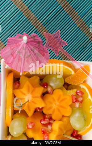 Bowl with fruit salad cut in fancy shapes, a kid dessert Stock Photo