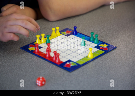 children playing a game of ludo Stock Photo