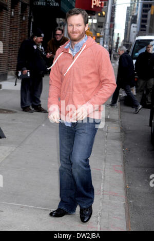 Stock car racing driver Dale Earnhardt Jr. enters the 'Late Show With David Letterman' at the Ed Sullivan Theater on February 24, 2014 in New York City Stock Photo