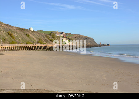 Sandy beach by the harbour at Folkestone in Kent. England Stock Photo