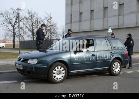 Berlin, Germany. 26th Feb, 2014. A man like complaining collided with his car into the gates of the Federal Chancellery in Berlin, on February 26, 2014. Credit:  Goncalo Silva/NurPhoto/ZUMAPRESS.com/Alamy Live News