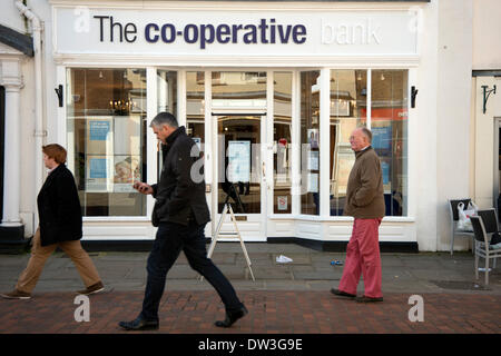 Chichester, UK. 26th February 2014. The  Co-operative group with £2bn losses for 2013 are actively looking to sell off their farms and pharmacies. Pictured: The Co-opeartive bank branch on Chichester high street, West Sussex Credit:  Rob Wilkinson/Alamy Live News Stock Photo