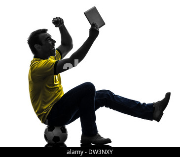 one  man holding digital tablet in silhouette on white background Stock Photo