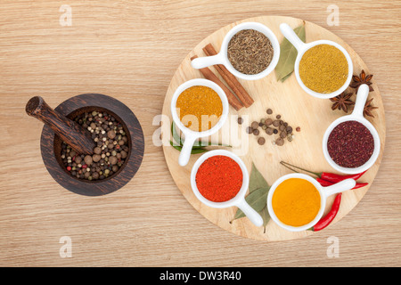 Various spices selection on wooden table Stock Photo