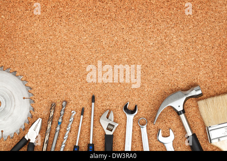 Set of tools on cork panel background with copy space Stock Photo
