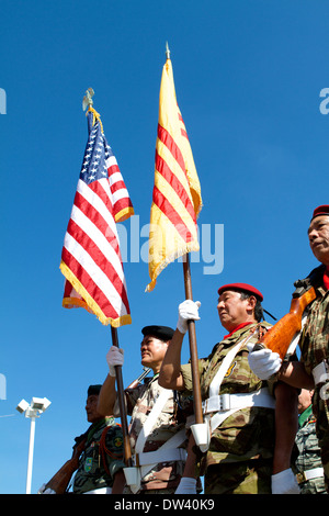 South Vietnamese military members parade their former  flag along side the American flag at the Tet Festival  California Stock Photo