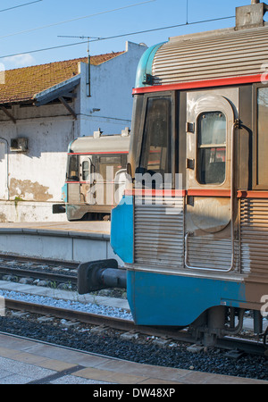 Two diesel trains in the rail station at Faro, Algarve, Portugal, Europe Stock Photo