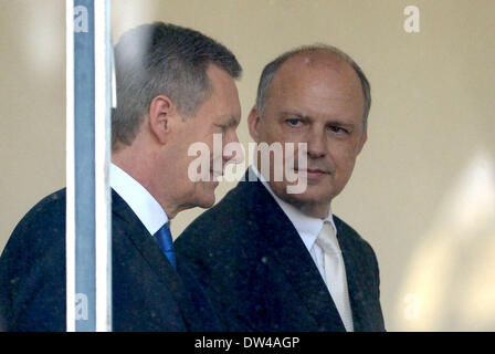 Hanover, Germany. 27th Feb, 2014. Former German President Christian Wulff arrives at the regional court with his lawyer Michael Nagel in Hanover, Germany, 27 February 2014. Two years after his resignation, the former President has been cleared of the charges of accepting benefits by the court. Photo: PETER STEFFEN/dpa/Alamy Live News Stock Photo