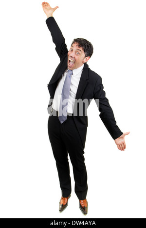 Excited middle-aged businessman in a suit celebrating an achievement or success cheering and raising his arms in the air Stock Photo