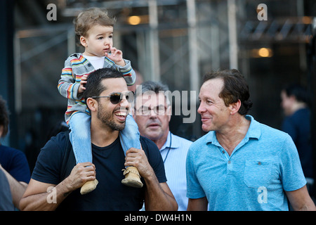 David Blaine, his daughter Dessa and Steve Guttenberg walk around the site of his latest challenge, 'Electrified' which features Blaine attached to a series of Tesla coils for 72 hours straight, without breaks for sleep or food held at Pier 54, Manhattan. Stock Photo