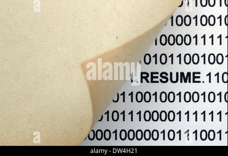 Resume text behind paper Stock Photo