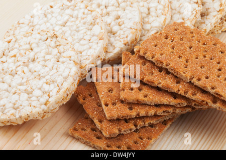 grain Crispbread, different types of cereal crackers on table Stock Photo