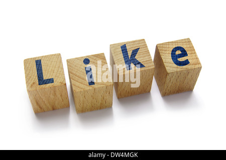 wood blocks with like word on black background Stock Photo