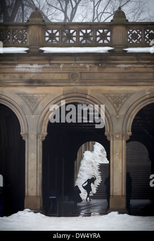 Manhattan New York city in North America, Pictured Grand Central Park a dancer poses in Bethesda Arcade Stock Photo