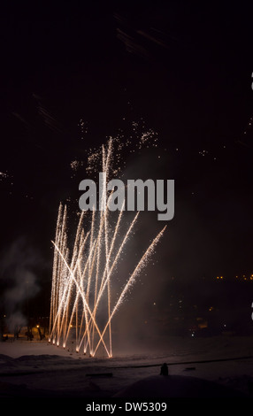 Fireworks in a dark evening in winter Stock Photo