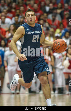 Albuquerque, New Mexico. 25th Feb, 2014. Utah State Aggies guard/forward Spencer Butterfield #21 in action during the NCAA basketball game between Utah State Aggies and University New Mexico Lobos at The Pit in Albuquerque, New Mexico. Credit Image © Lou Novick/Cal Sport Media/Alamy Live News Stock Photo