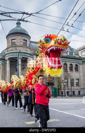 Dragon team getting ready for the Chinese New Year Parade, Vancouver, British Columbia, Canada Stock Photo