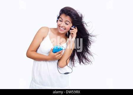 indian Beautifu Model  Hearing Music Stock Photo