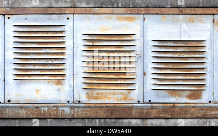 Background with old rusted metal ventilation grille panels Stock Photo