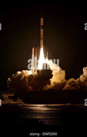A Japanese Aerospace Exploration Agency H-IIA rocket carrying the NASA-JAXA Global Precipitation Measurement Core Observatory satellite launches from the Tanegashima Space Center Februjary 28, 2014 in Tanegashima, Japan. The GPM spacecraft will collect information that unifies data from an international network of existing and future satellites to map global rainfall and snowfall every three hours. Stock Photo