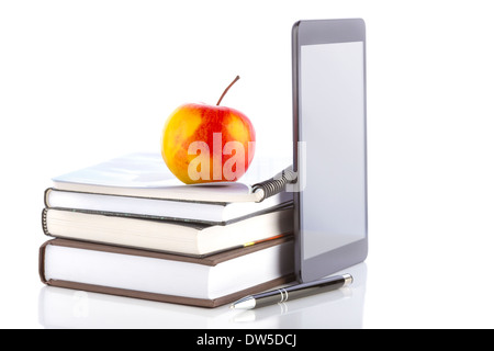 Concept of online education. Tablet pc with school and office supplies. Stock Photo