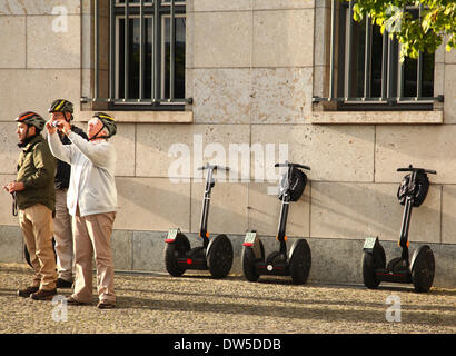 Tourist taking photos of a piece of the former Berlin Wall in Berlin, September 19, 2013. More and more tourists come to the German capital every year. The photo is part of a series on tourism in Berlin. Photo. Wolfram Steinberg dpa Stock Photo