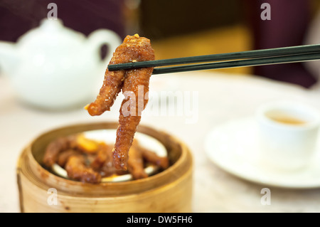 Steamed chicken feet at Hong Kong dim sum restaurant Stock Photo