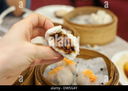 Cha Siu Bao barbequed pork bun at Hong Kong dim sum restaurant Stock Photo