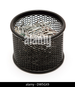 Paper clips in the black metal office pot on a white background. Stock Photo
