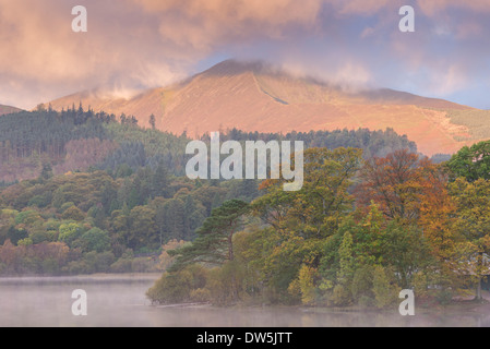 Autumn foliage on the banks of Derwentwater at dawn, Lake District, Cumbria, England. Autumn (October) 2012. Stock Photo