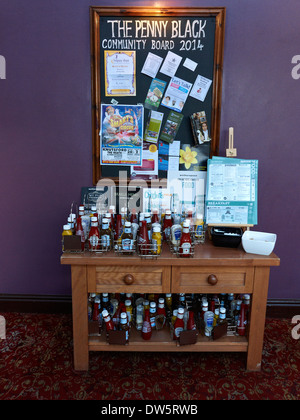 The sauces corner in The Penny Black Wetherspoon pub, Northwich Cheshire UK Stock Photo