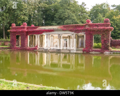 Virginia Creeper in full colour covering ancient columns and arches at Didlington Manor Norfolk England Stock Photo