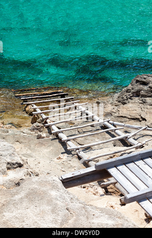 Wooden stair entering down in the sea Stock Photo