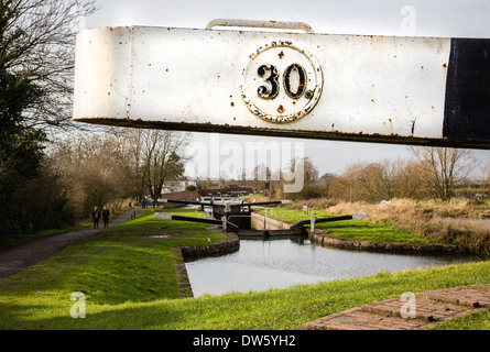 Lock thirty on the main flight of locks at Caen Hill on the Kennet and Avon canal near Devizes in Wiltshire Stock Photo