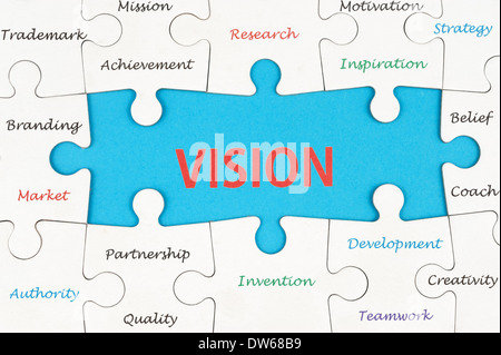 Vision concept word cloud on group of jigsaw puzzle pieces Stock Photo
